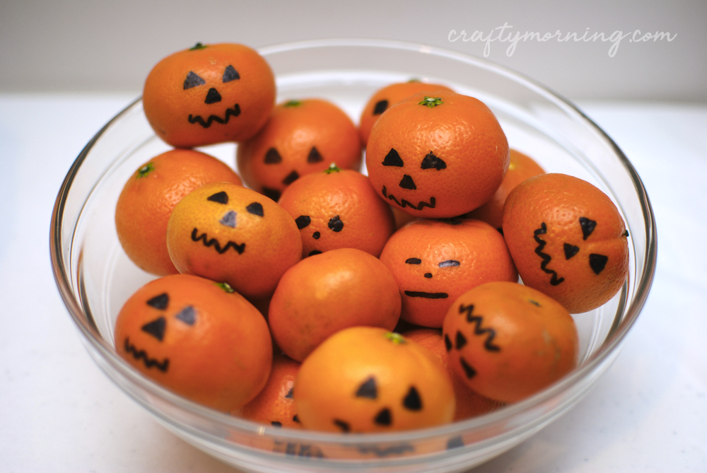 Decorate Clementines like Jack-O-Lanterns